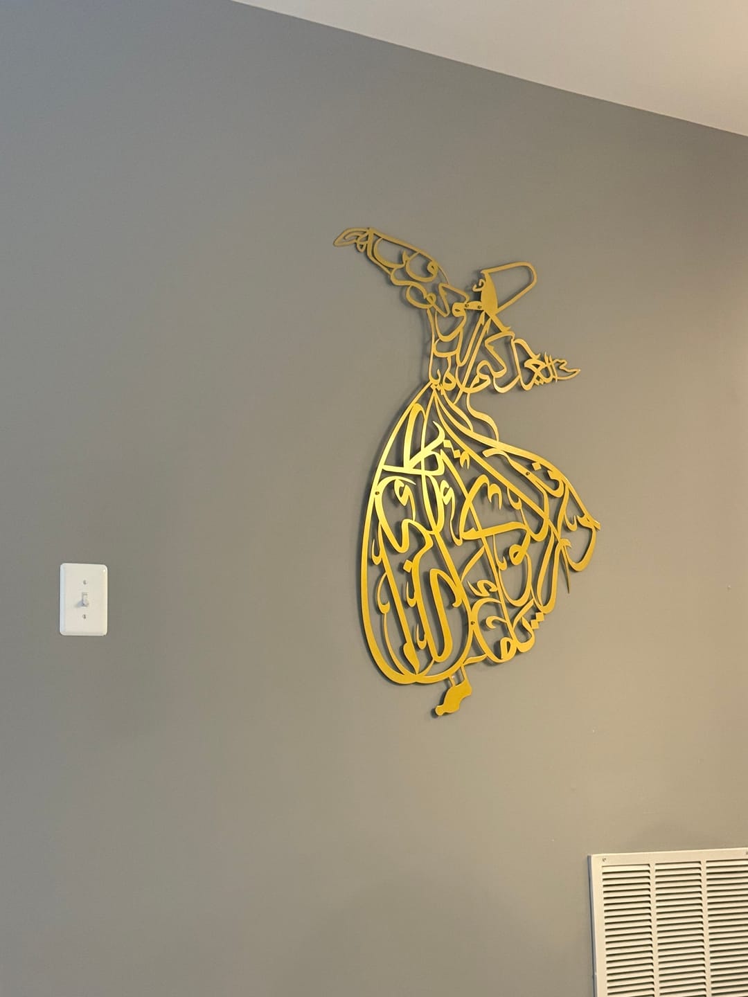 Customer photo review of Whirling Dervish Metal Islamic Wall Art
