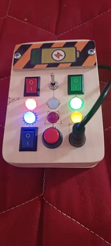 Customer photo review of Spark Switch Montessori Busy Board-V1