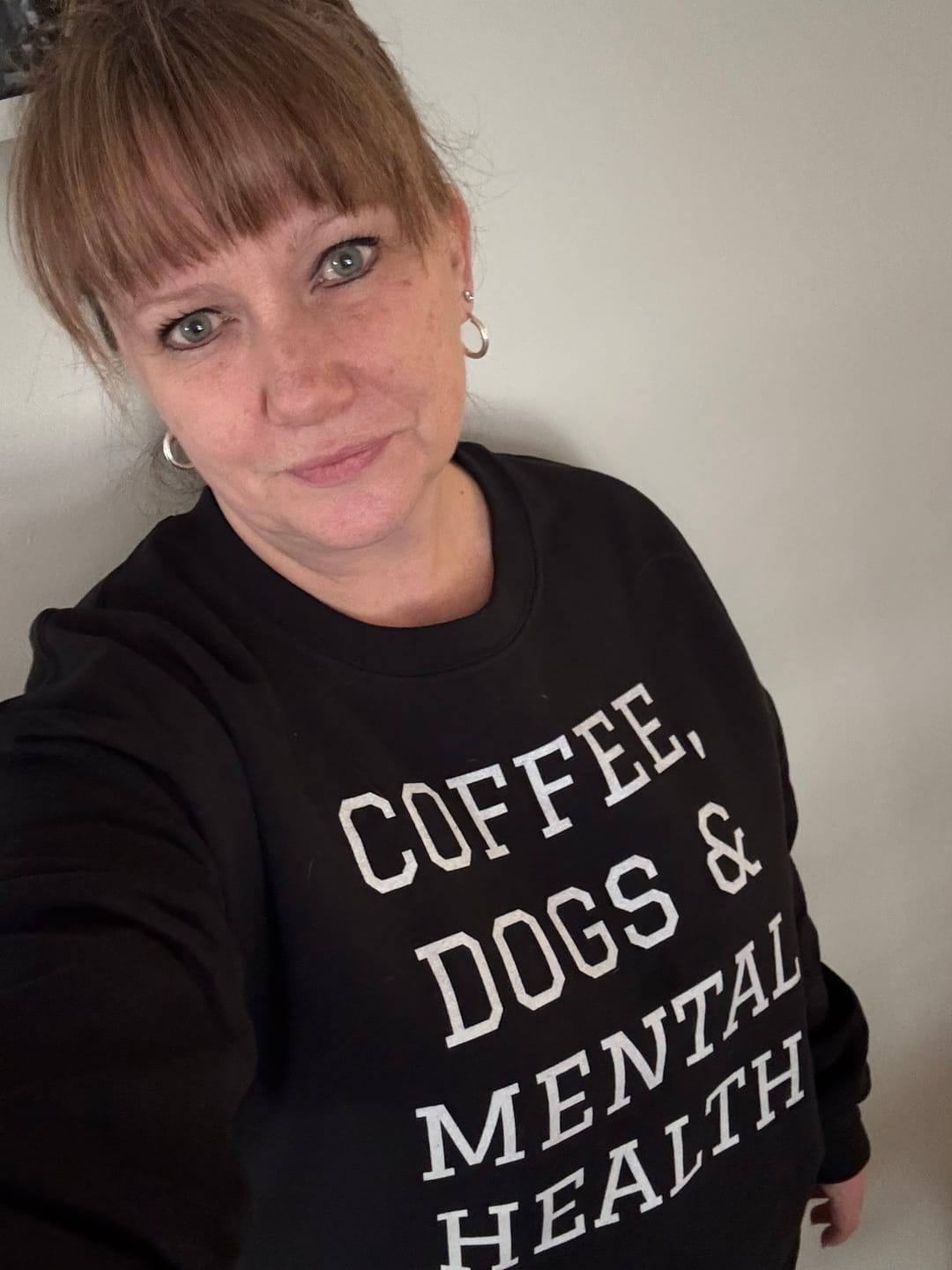 Customer photo review of Coffee, Dogs & Mental Health Sweatshirt