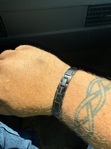 Customer photo review of Body Armor Titanium Magnetic Bracelet: Helps Pair Veterans With A Service Dog Or Shelter Dog