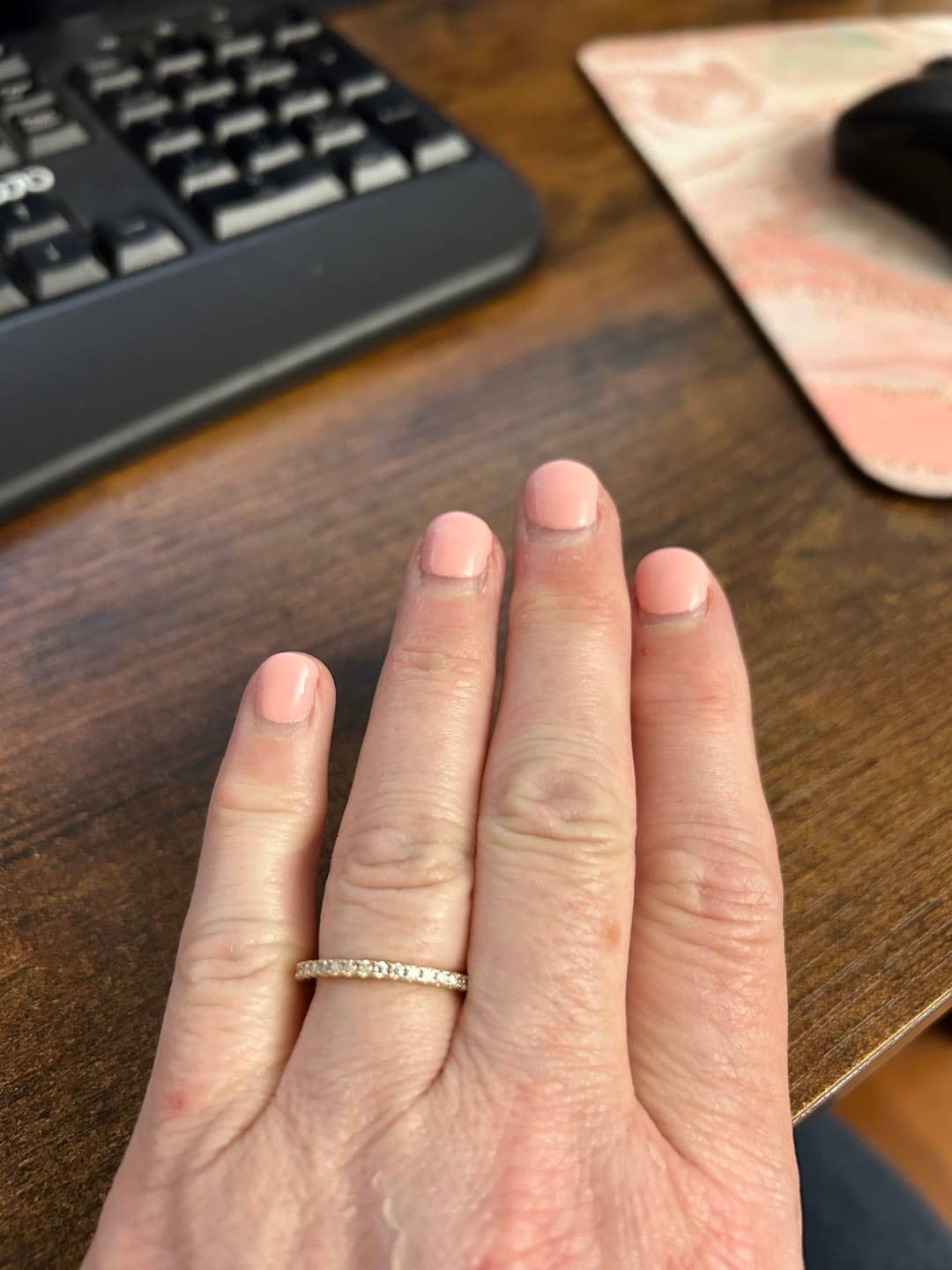 Customer photo review of Moissanite Round Half Eternity Sterling Silver Wedding Band Stackable Ring