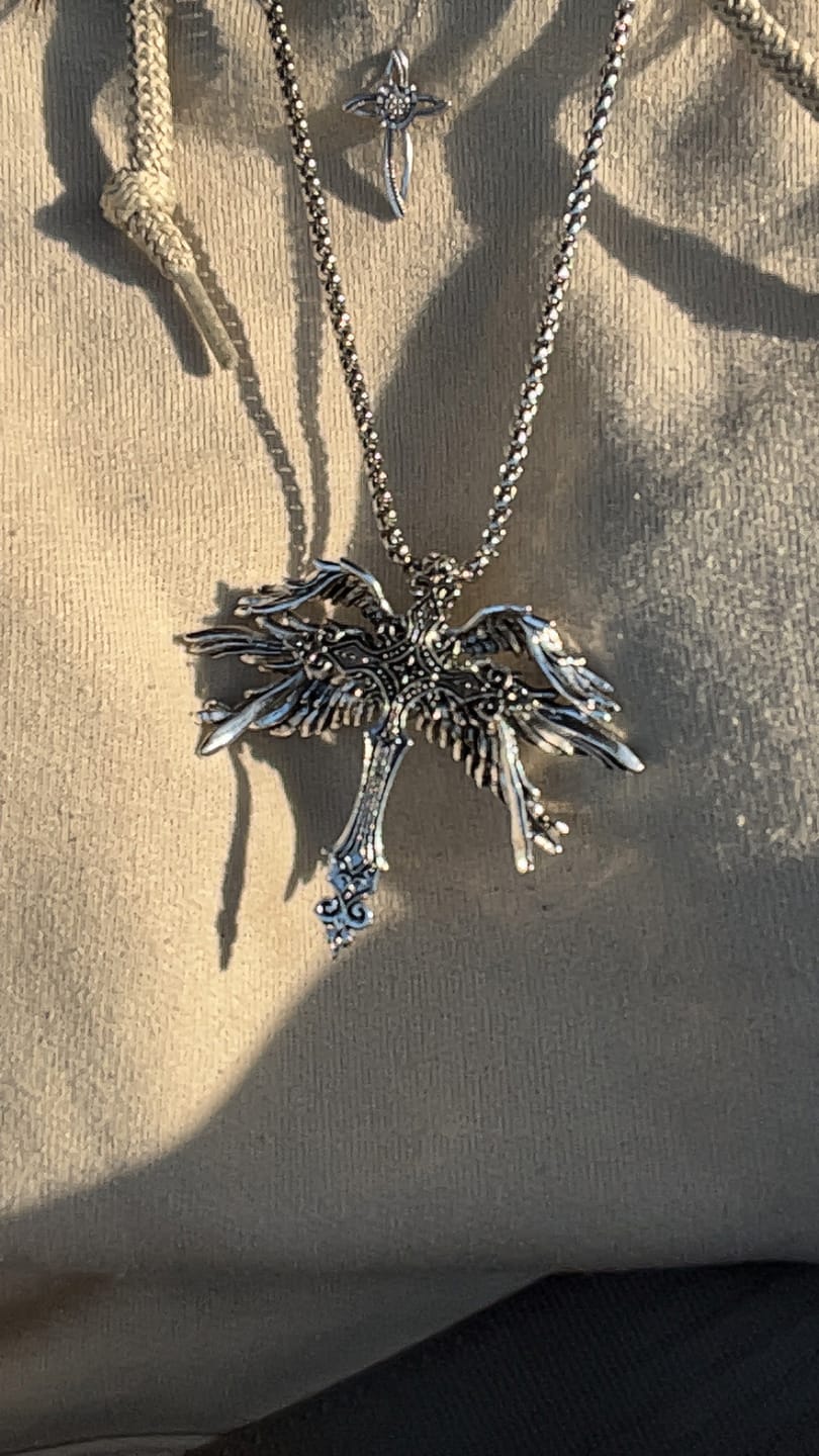 Customer photo review of Celestial Cross Necklace