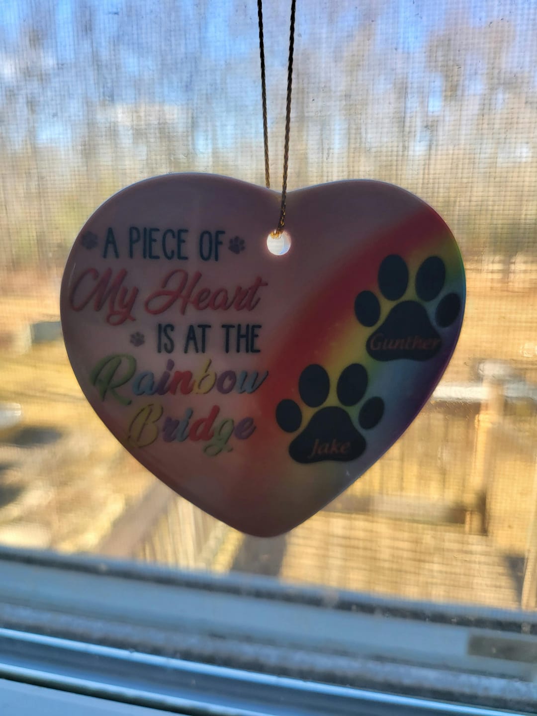 Customer photo review of A Piece Of My Heart Is At The Rainbow Bridge - Dog Memorial Gift - Personalized Custom Heart Ceramic Ornament OW0001