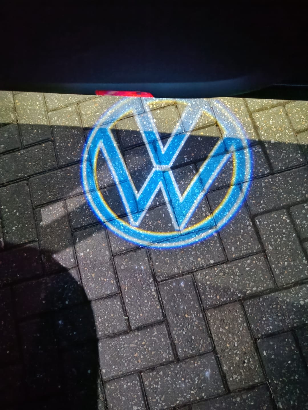 Customer photo review of Volkswagen Door lights Original Logo  Nr. 157 ( quantity 1 = 2 logo film / 2 door lights)