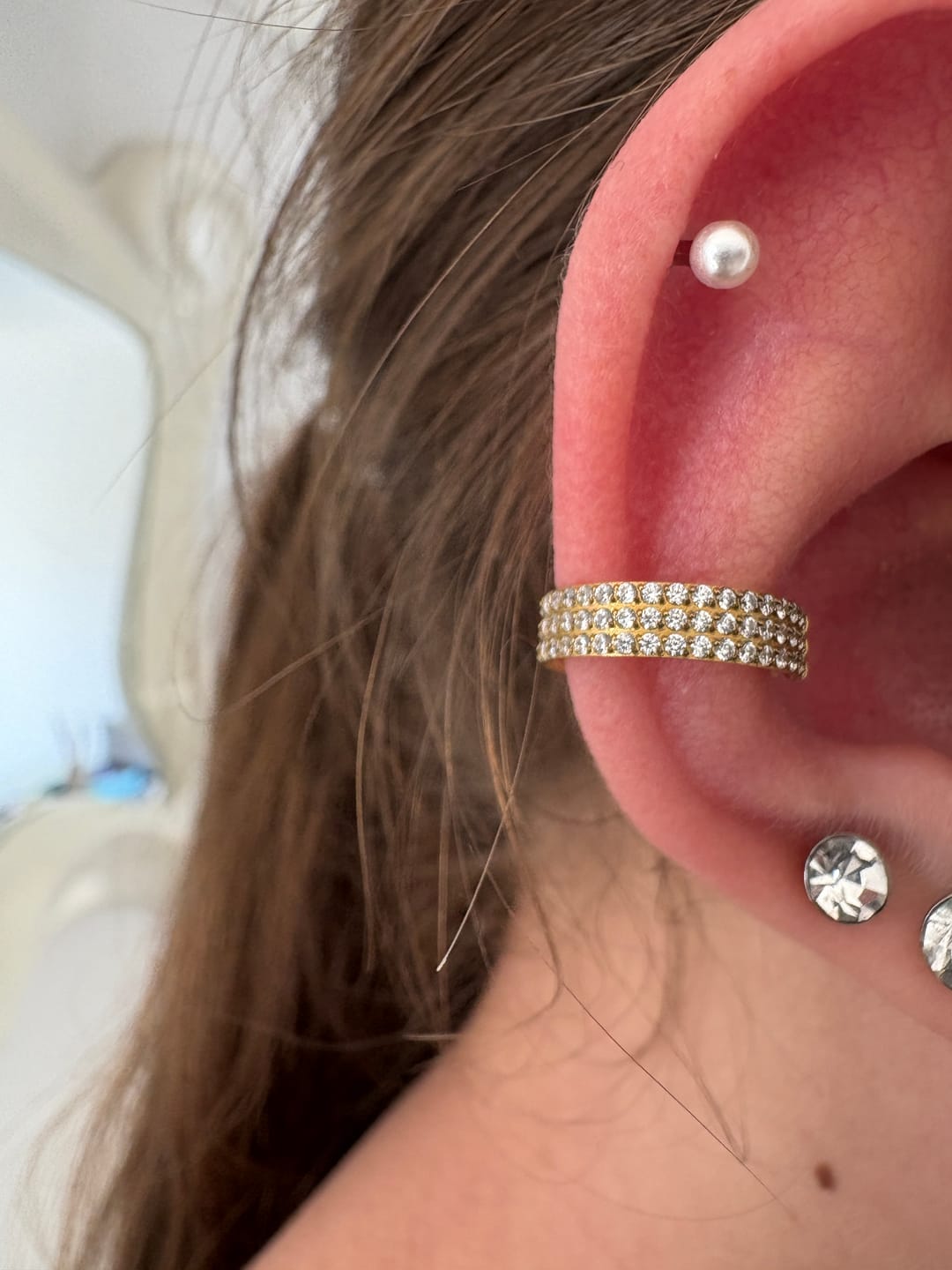 Customer photo review of Triple Conch Piercing | Titan
