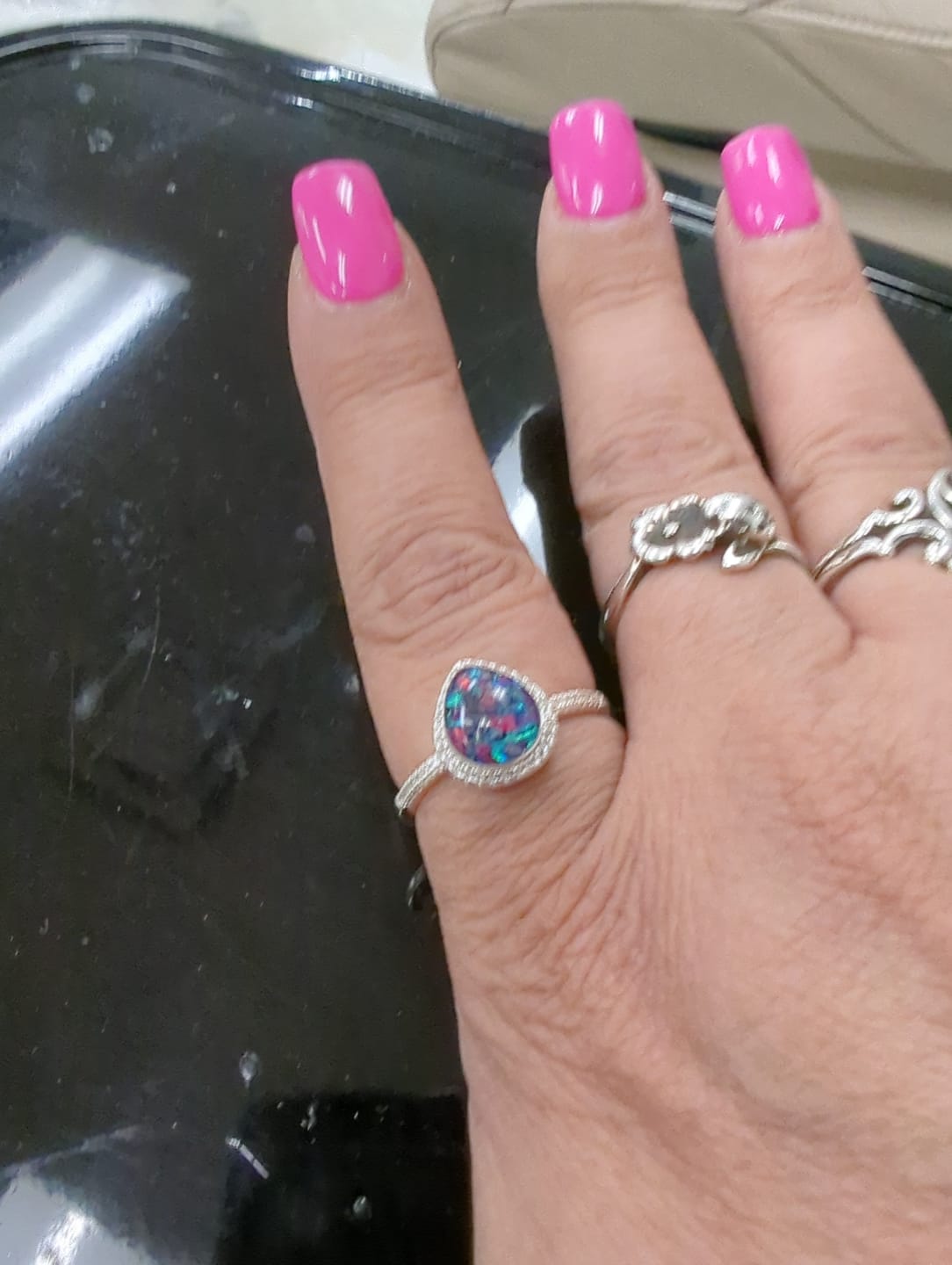 Customer photo review of Bedazzled Pear Opal Ring with Cremation Ashes