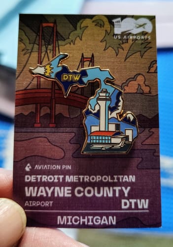 Customer photo review of Airport Enamel Pin | DTW - Michigan