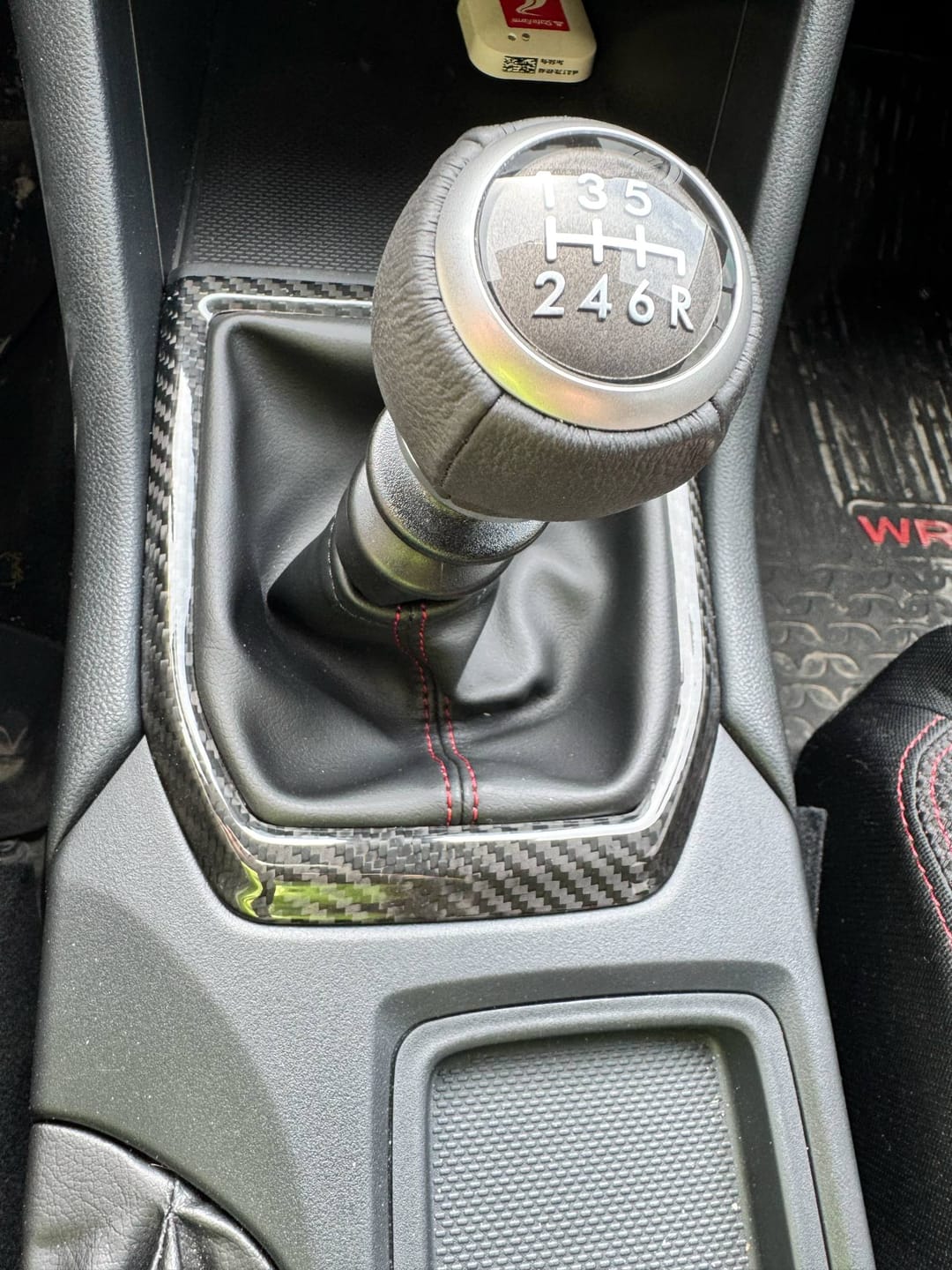 Customer photo review of 2022-25 Subaru WRX VB Black Carbon Fiber Shifter Trim Cover