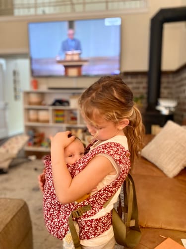 Customer photo review of Merlot Bloom Desert Tan Original Baby Carrier by Happy Baby