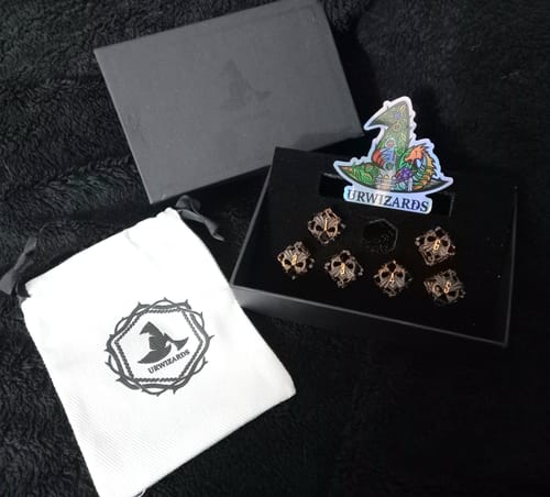 Customer photo review of URWizards D&D Hollowed Metal Dice Set Dragon