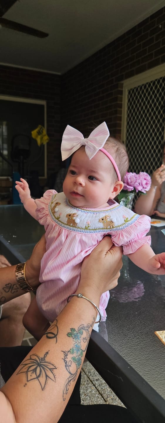 Customer photo review of Bunny Garden Smocked Romper