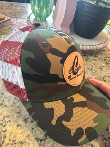 Customer photo review of Camo Custom Leather Patch Trucker Hat