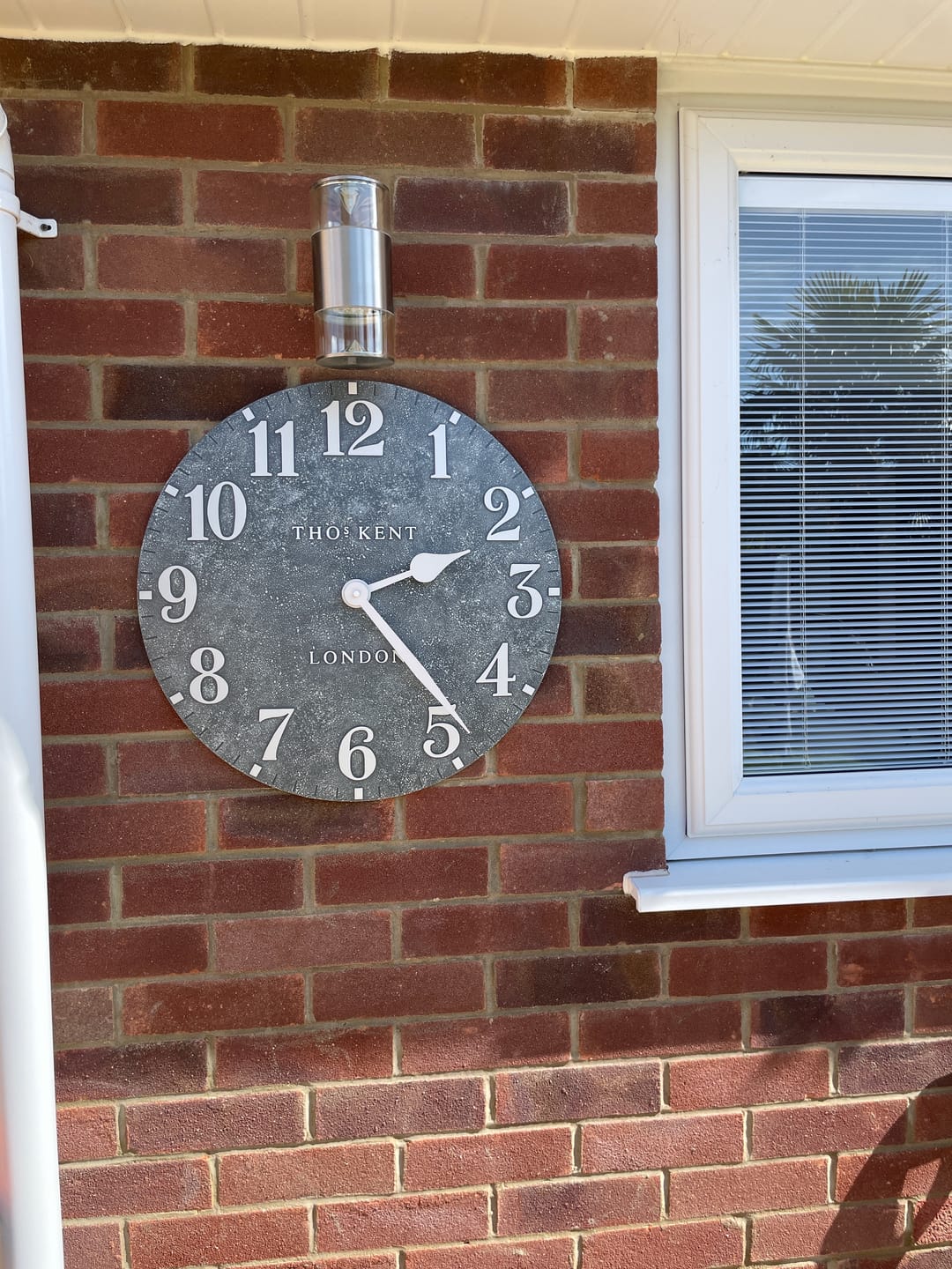 Customer photo review of Thomas Kent London. Arabic Outdoor Wall Clock 20" (51cm) Cement