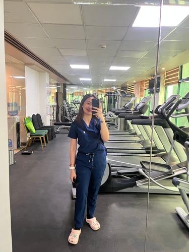 Customer photo review of 3-Pocket MoveTech® Scrub Top - Women / Industrial White