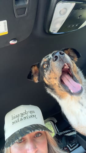 Customer photo review of MHC My Dog Said You're a Hoe Trucker Hat