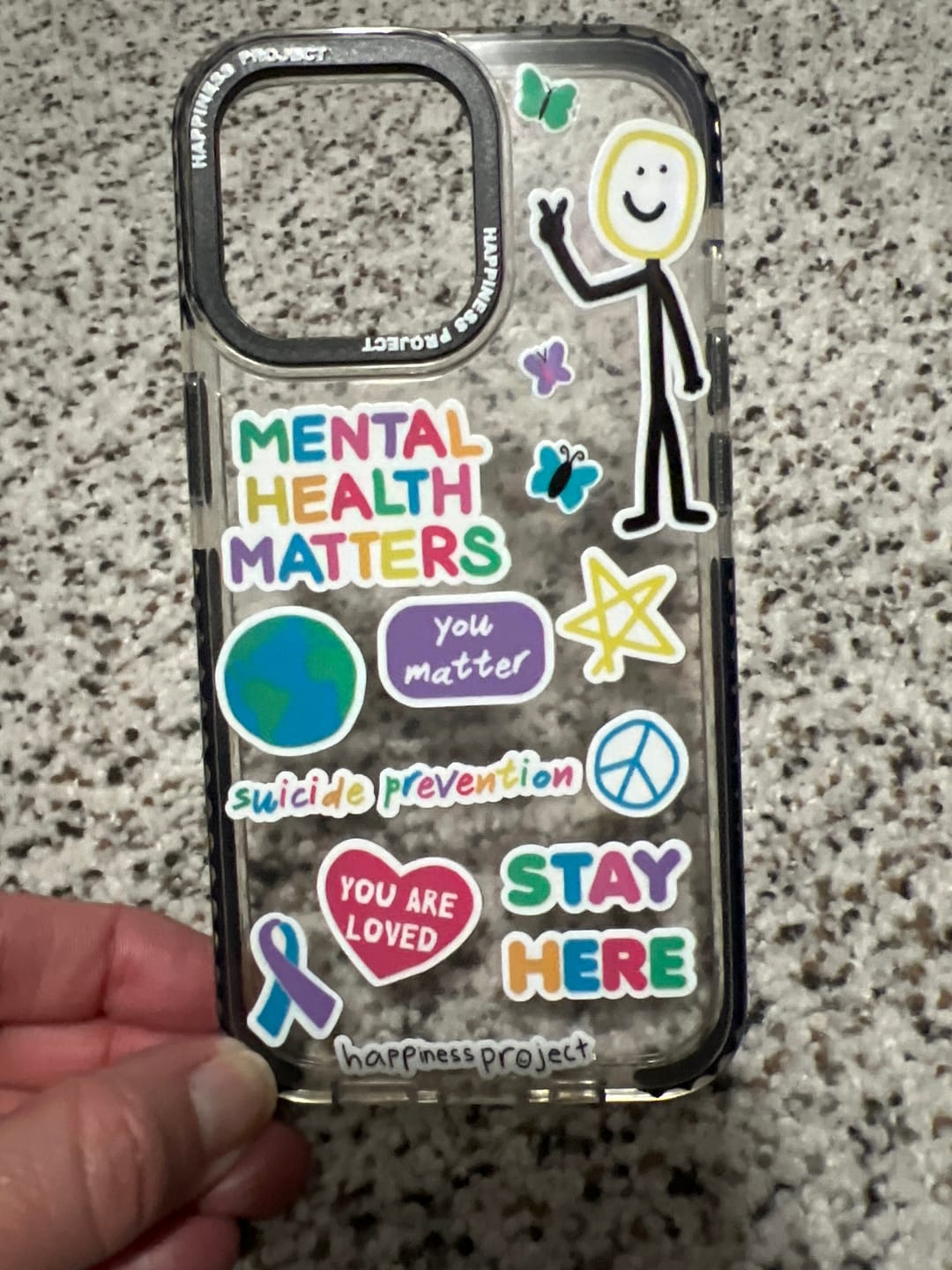 Customer photo review of Happiness Phone Case