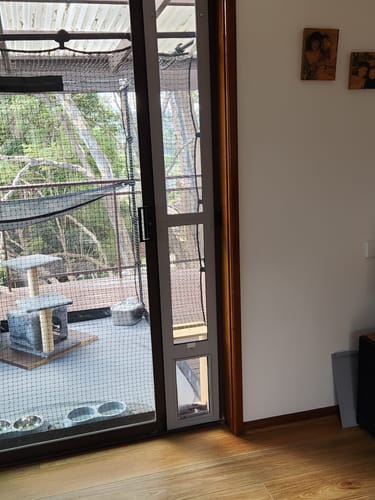 Customer photo review of Folding Patio Pet Door Insert [Colour: Silver] [Size: Small]
