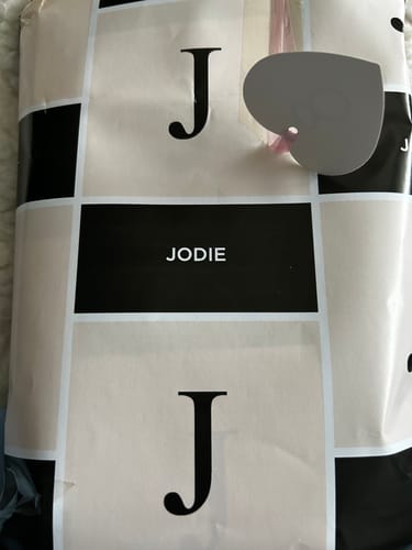 Customer photo review of Black Neutral Personalised Initial Wrapping Paper