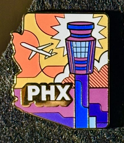 Customer photo review of Airport Enamel Pin | PHX - Arizona