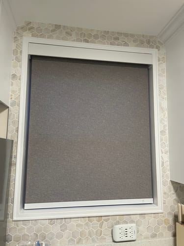 Customer photo review of SmartWings Motorized Light Filtering Roller Shades 70% Blackout Safari