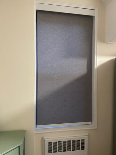 Customer photo review of SmartWings Motorized Light Filtering Roller Shades 70% Blackout Safari