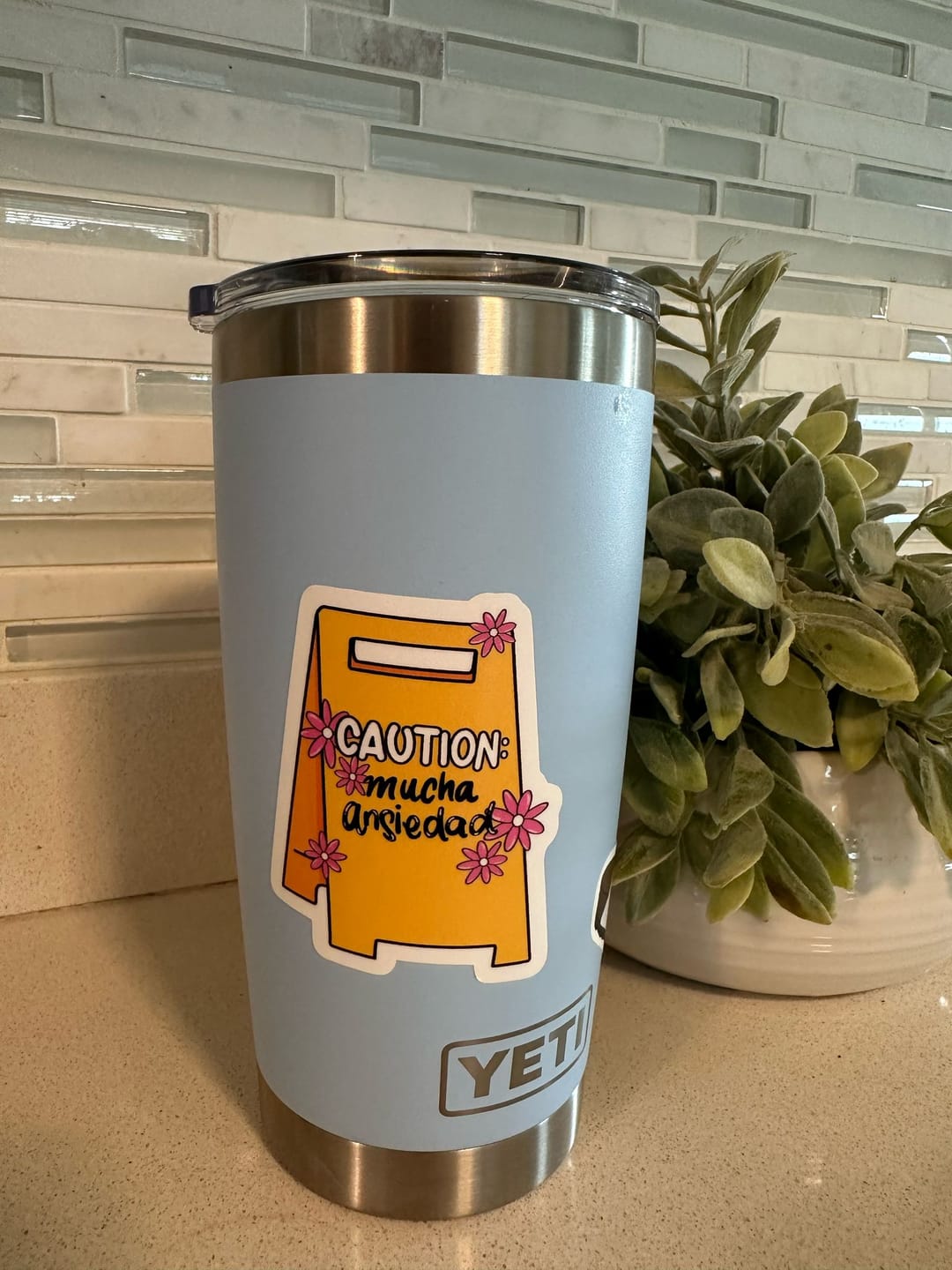 Customer photo review of Caution: Mucha Ansiedad (Sticker Laminado)