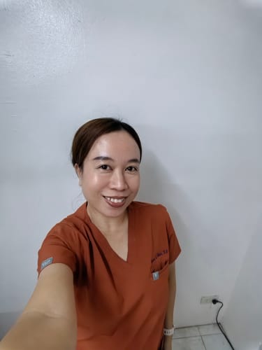 Customer photo review of 5-Pocket MoveTech® Scrub Top - Women / Terracotta