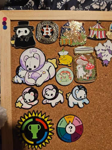 Customer photo review of Moon Bear Enamel Pins