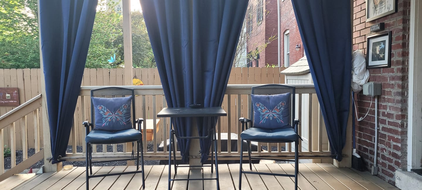 Customer photo review of Top & Bottom Grommet Windproof Outdoor Curtains for Patio 1 Panel