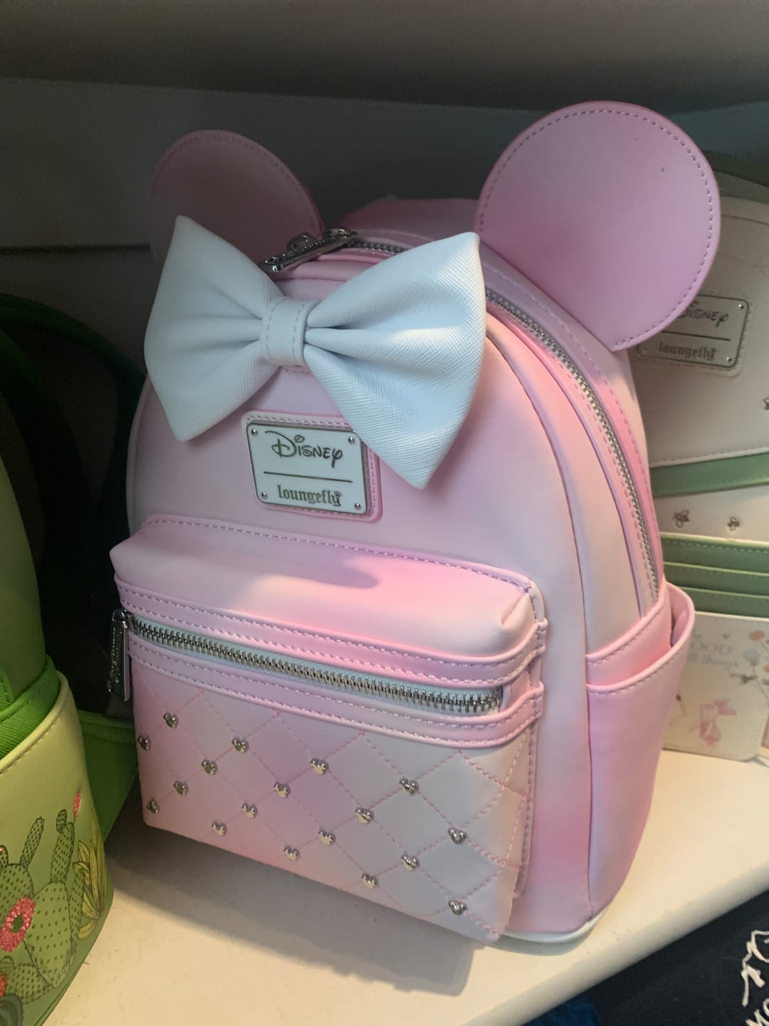 Customer photo review of Loungefly Disney The Minnie Mouse Classic Series Mini Backpack: Sakura - 707 Street Exclusive