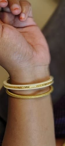 Customer photo review of "Ancient Gold Elegance: Cream Bangle Beauty " (2 Pis)