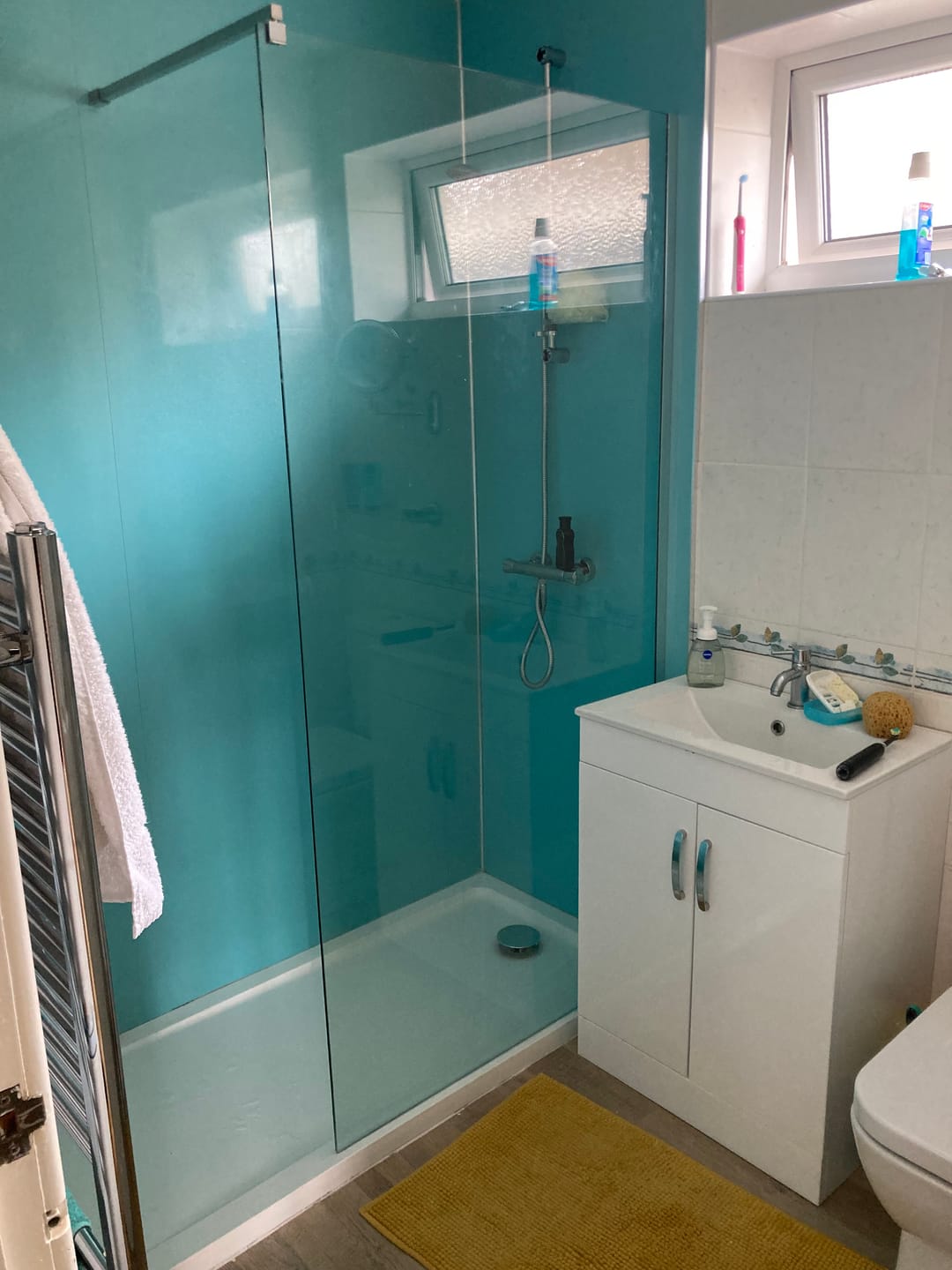 Customer photo review of 10mm Aqua Blue Shimmer Gloss Shower Panel 1M x 2.4M
