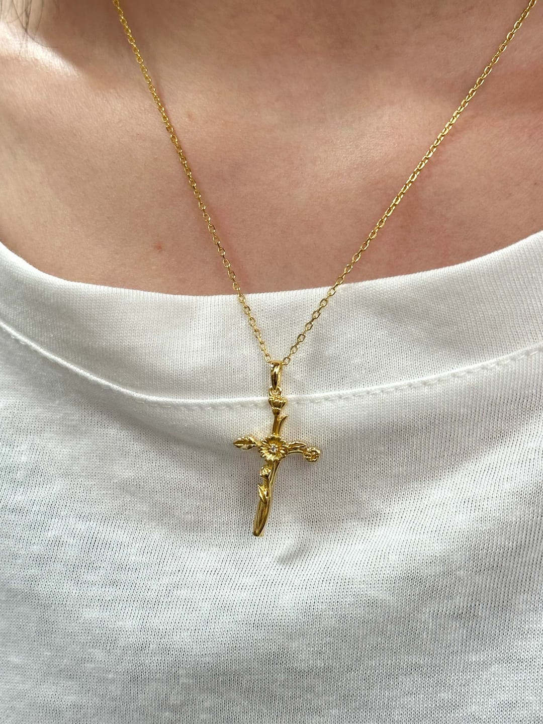 Customer photo review of Floral Cross April Daisy Birth Flower Necklace