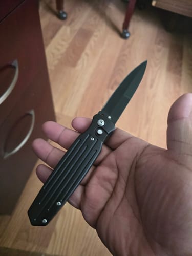 Customer photo review of Maddox Push Button Switchblades