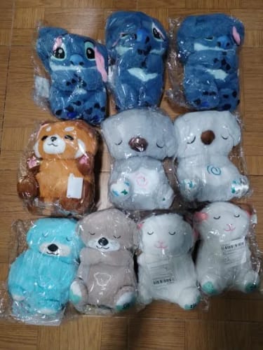 Customer photo review of Red Panda Breathing Musical Plush Toy