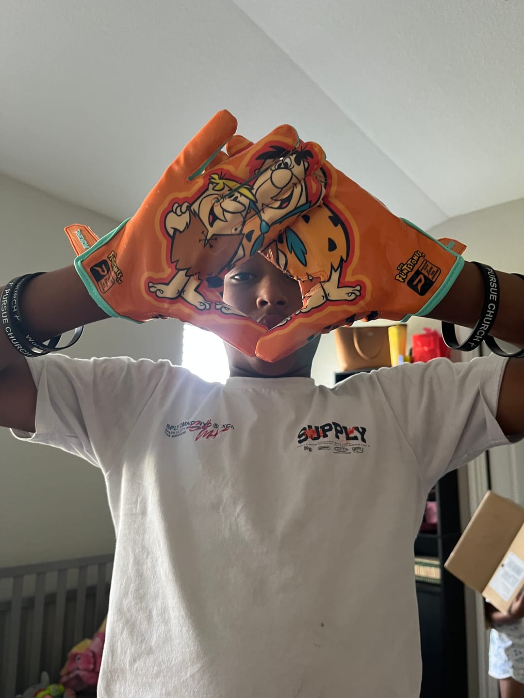 Customer photo review of The Flintstones "Bedrock Blitz" Football Gloves - VPS5 by Phenom Elite