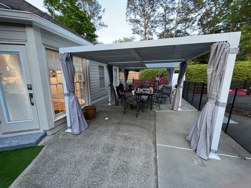 Customer photo review of HOMREST Louvered Pergola 12x20 Outdoor Hard Top Pergola with Aluminum Frame and Adjustable Metal Rainproof Roof for Garden & Patio, Curtains and Netting Included, Gray-White
