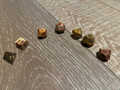 Customer photo review of URWizards D&D Petrified Wood Gemstone Engraved Dice Set(Limited edition)