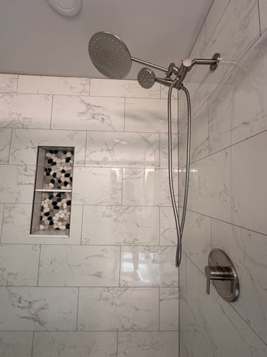Customer photo review of 1-Handle Valve and Trim Shower System with 3-Spray Dual Shower Head and Adjustable Arm