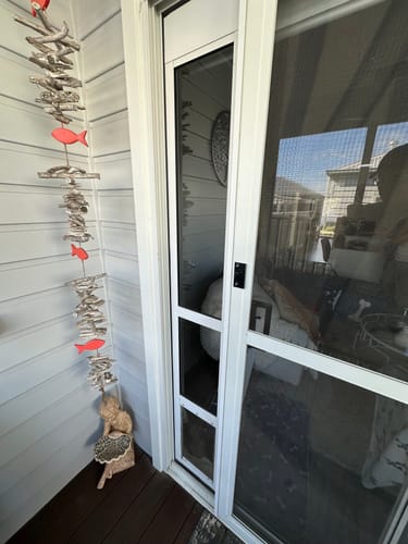 Customer photo review of Folding Patio Pet Door Insert [Colour: White] [Size: Medium]