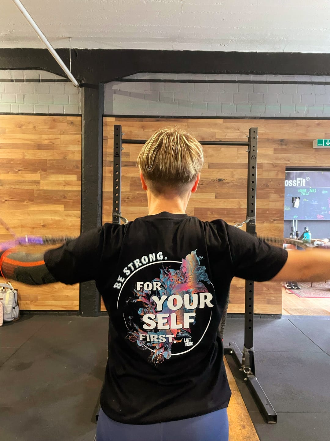 Customer photo review of Be strong Tee