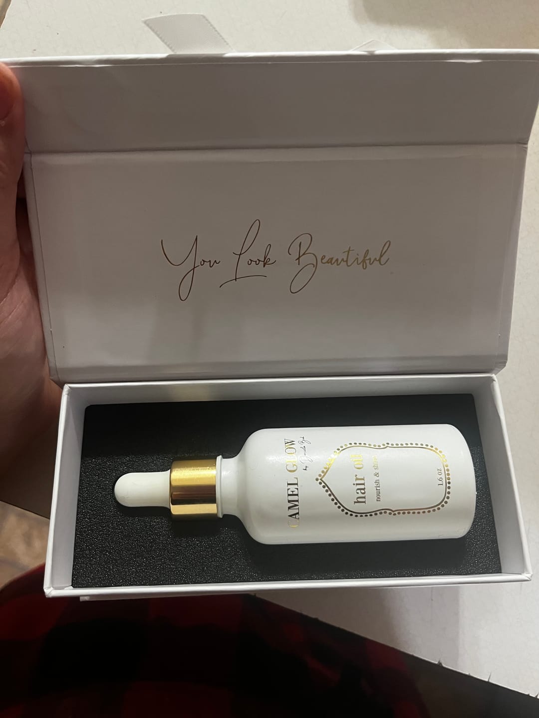 Customer photo review of Nourish & Shine Hair Oil