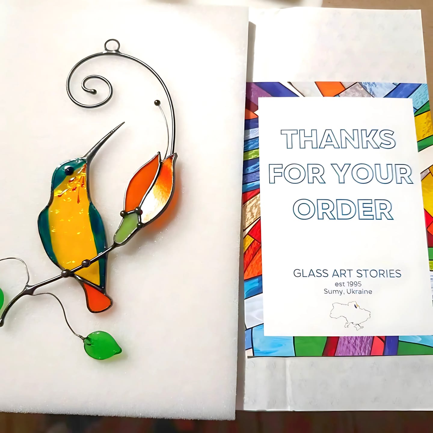 Customer photo review of Stained glass suncatcher bird - Hummingbird with Orange Flower