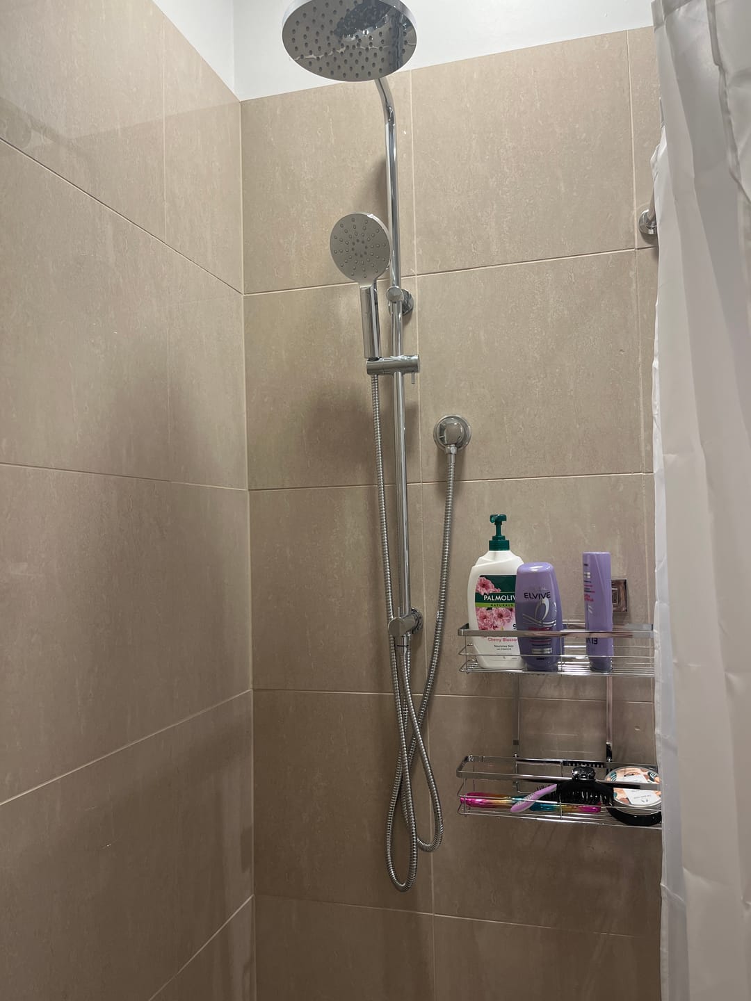 Customer photo review of Eli Round Dual Hose Variable Water Inlet Twin Shower Rail