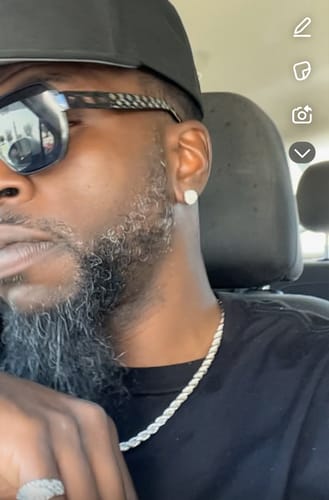 Customer photo review of 0.66 CTW Large Round VVS1 Moissanite Earrings