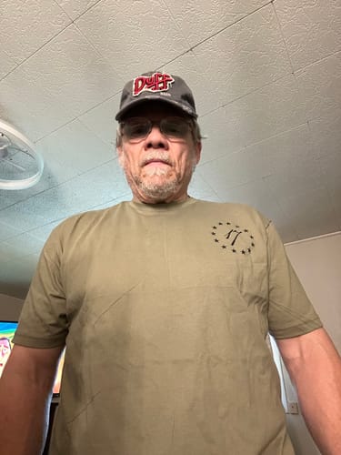 Customer photo review of GUNS OF UNITY TEE