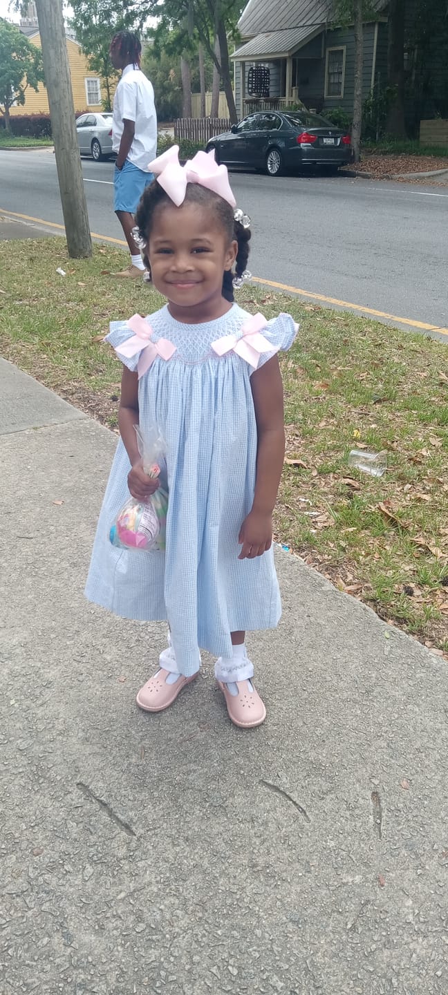 Customer photo review of Spring In Blue Seersucker Smocked Bow Dress