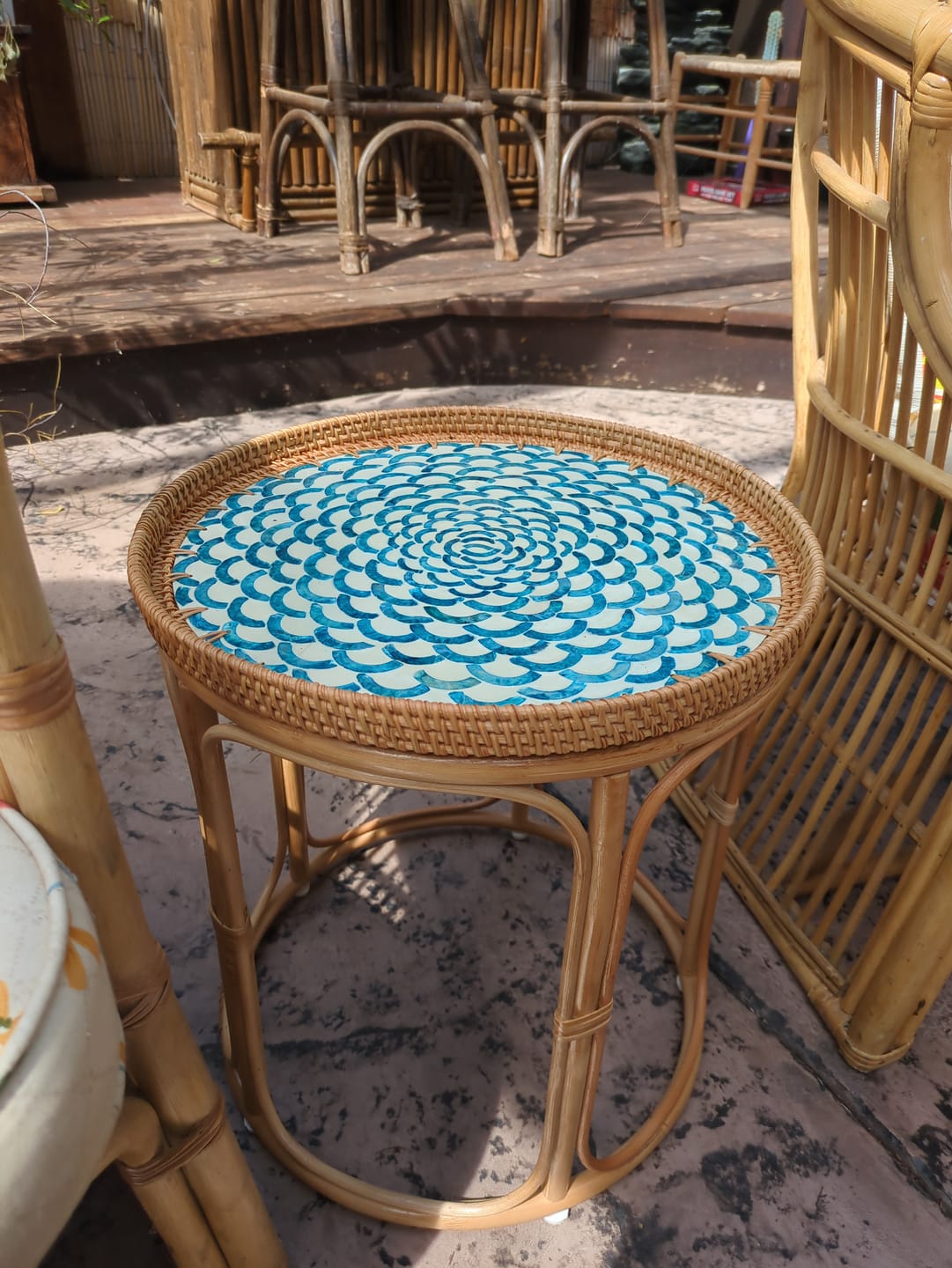 Customer photo review of Bloom Rattan Table