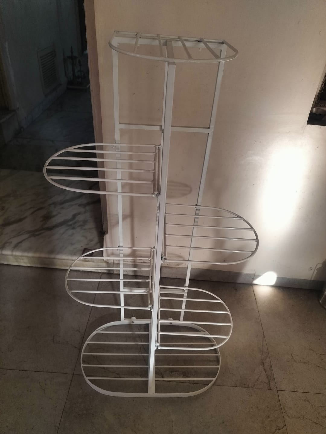 Customer photo review of UnitedCrafts 6 Tier 7 Potted Metal Plant Stand Multiple Shelves