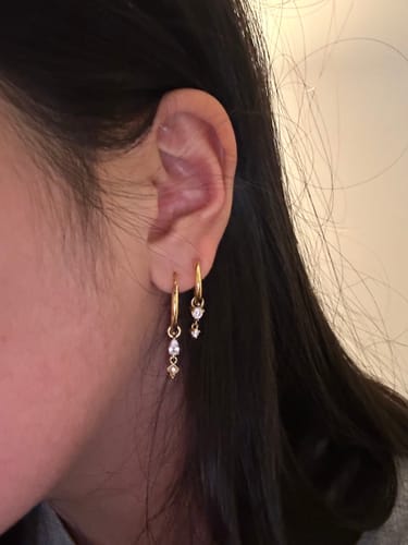 Customer photo review of My Huggies Hoop Earrings
